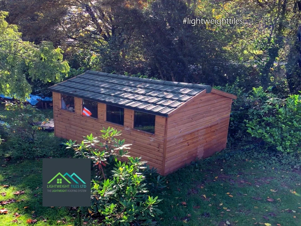 Large garden shed roof replacement with Green Granulated recycled tiles