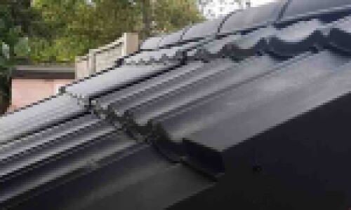 Close up image of black shed roof replacement tiles by Lightweight Tiles