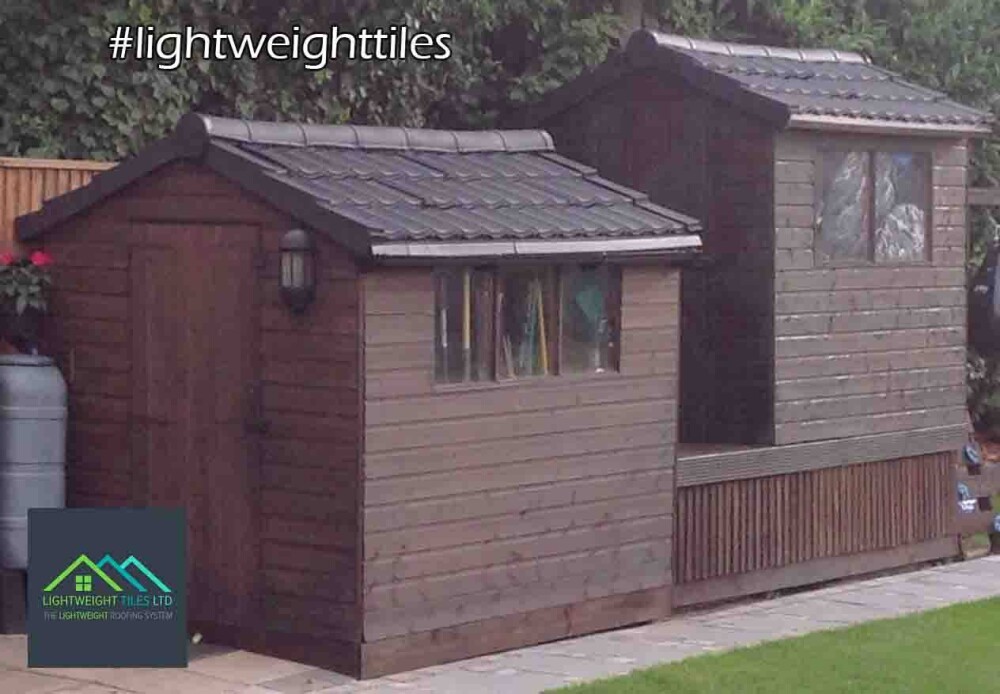 Image of two garden shed roof replacement with black Lightweight Tiles