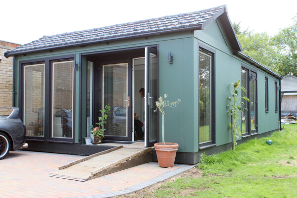 Garden annexe roof finished with Granulated Grey Lightweight Roof Tiles. Garden annexe in Braintree with Granulated Grey Lightweight Roof Tiles installed, providing a durable and lightweight roofing solution.