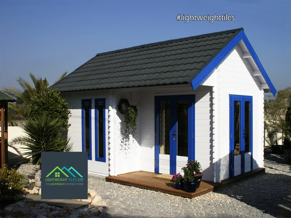 beach hut with grey lightweight roof tiles WEB v2