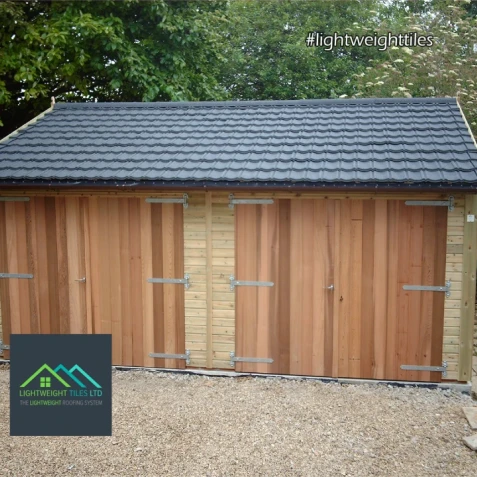 Beautiful grey granulated plastic garage roof replacement by lightweight tiles
