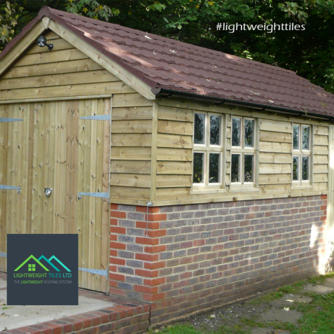 Wooden garage roof replacement in Brown plastic tiles by lightweight tiles